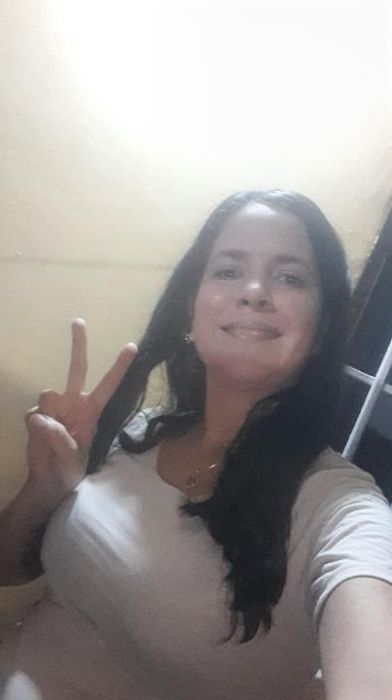 Miembro de la comunidad Premia2 con su premio